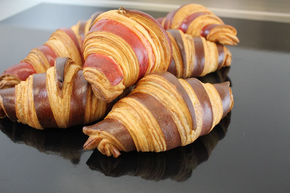 Bicolor chocolate croissants with flaky laminated layers, a Le Levain signature